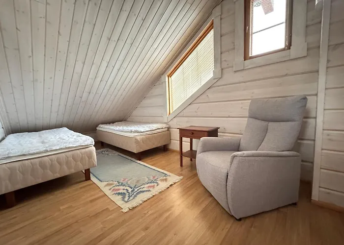 Villa Hirsihuvila Kolilla, Lumme